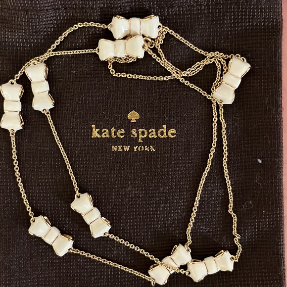 Kate Spade necklace. Gold tone with cream bows - Picture 3 of 4